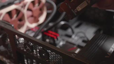 IT technician install a graphic card into a desktop computer Stock Footage 137945151