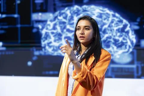 IT technician speaking at tech event, explaining impact of AI technology Stock Photos