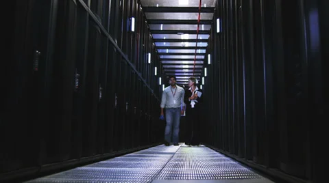 IT Technicians in data center. People working in computer server room data Vídeos de archivo 32722775