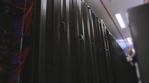 IT Technicians in data center. People working in computer server room data Vídeos de archivo 32723084