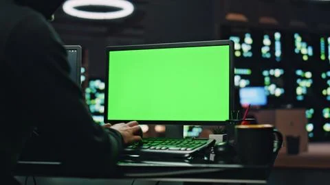 IT technologist coding chromakey computer at datacenter closeup. Man working Foto stock