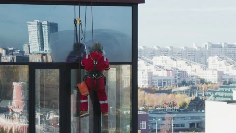 It is time to clean windows at home and corporate skyscrapers, industrial Stock-Footage 218617169