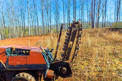 It is a trencher cable plow tractor that is used to lay fiber optic cables Stock Photos
