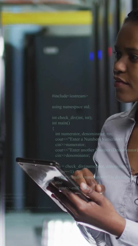 IT woman tapping tablet, activating translucent code overlay, checking server Stock Footage 331822341