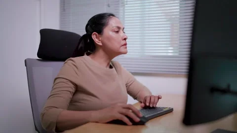 IT woman working on desktop computer in data center control room Young professio Stock Footage 270288251