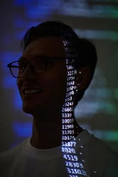 IT worker with computer code Stockfoto's