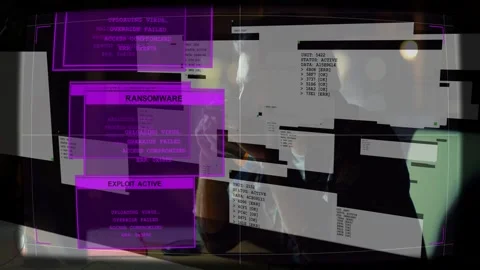 IT worker at desk watching alerts popping up, responding to ransomware panels Stock Footage 333062451