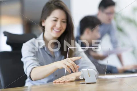 IT workers developing digital tablet Stock Photos