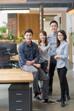 IT workers standing in office Stock Photos
