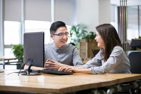 IT workers talking in office Stock Photos