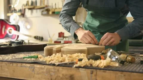 Italian artisan at work in lutemaker workshop Stock Footage 8975469