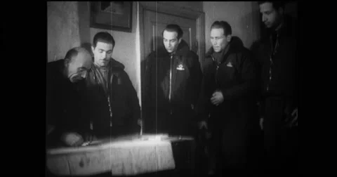 Italian aviators looking at map and receiving pre-flight instructions Stock Footage 43401322