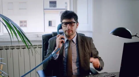 Italian business man or lawyer talking on the phone getting angry Stock Footage 59139375