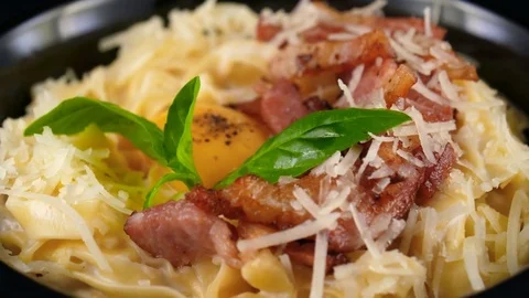 Italian Carbonara Pasta, served with egg yolk, bacon, parmesan 스톡 동영상 80708484