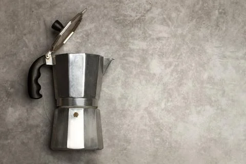 An italian coffee maker on a marble table with copy space Foto stock