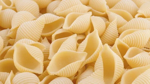 Italian conchiglie pasta rotating, (loopable) Stock Footage 92658657
