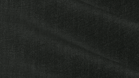Italian Dark Gray Wool Fabric forming premium charcoal waves of suiting 库存影片 337523633
