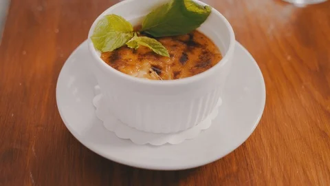 Italian dessert Pudding on the table in restaurant. Video stock 104294454