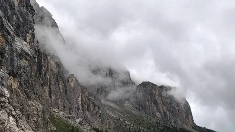 Italian Dolomites in clouds. Timelapse of clouds rolling through rocky mountains Stock-Footage 115543833