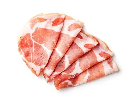 Italian dried ham. Coppa Stagionata isolated on white background. Stock Photos