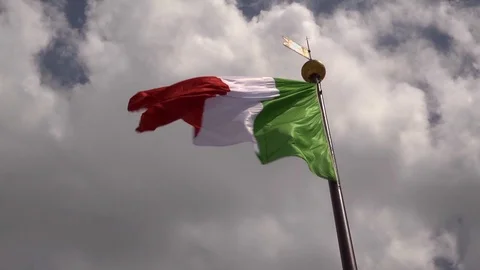 Italian flag on a cloudy sky Stock-Footage 126769496