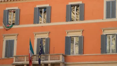Italian flag flapping gently against european building Video stock 10719823