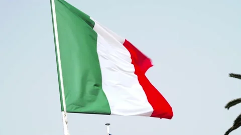 Italian flag wave in the wind on flagpole against the sky. Video stock 203566470