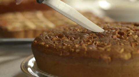 Italian hazelnuts cake with pine nuts for breakfast Vídeo Stock 64518111