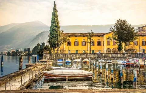 Italian lakeside village iseo dock boats Stock Photos