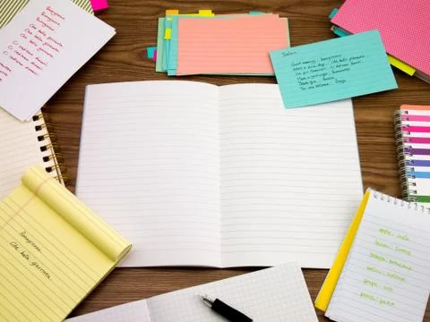 Italian; Learning New Language Writing Words on the Notebook Stock Photos