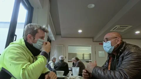 Italian Men Talking at Bar While Wears a Medical Mask During Covid-19 Pandemic Stock Footage 141385115