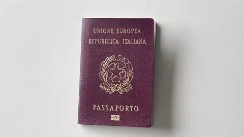 Italian passport on neutral background Stock Footage 328115357