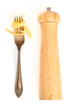 Italian pasta design elements. A fork with pappardelle, shot from above on a Fotos Stock