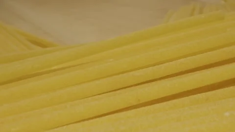 Italian pasta texture close-up macro. Flour products. Macaroni factory and pasta Stock Footage 262776943