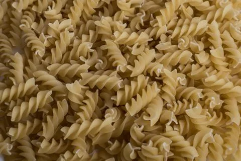Italian Penne Rigate Macaroni Pasta raw food background or texture Stock Photos