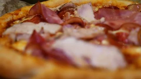 Italian pizza with meat, bacon, pepperoni, cheese Stock Footage 59203255