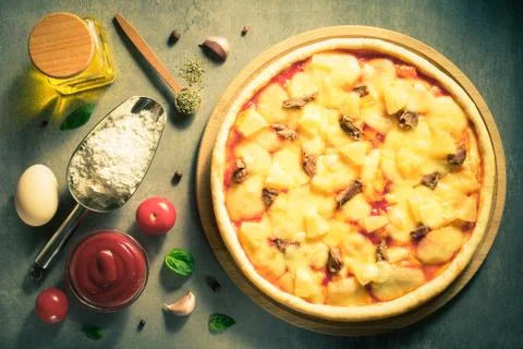 Italian pizza at table surface Stock Photos