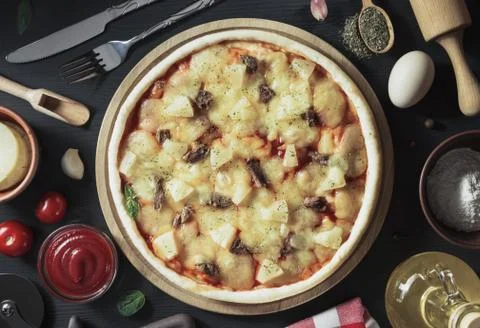 Italian pizza at table surface Stock Photos