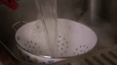 Italian spaghetti in the colander Stock Footage 74586439