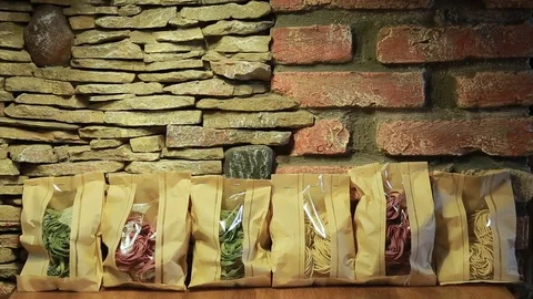 Italian spaghetti on counters of shops close-up Stock Footage 72755233
