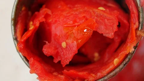 Italian tradition:squeezing tomatoes- Making homemade Tomato's sauce Stock Footage