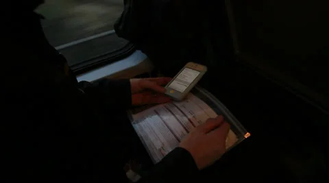 On a Italian train, close up iphone in use Stock Footage 34478042