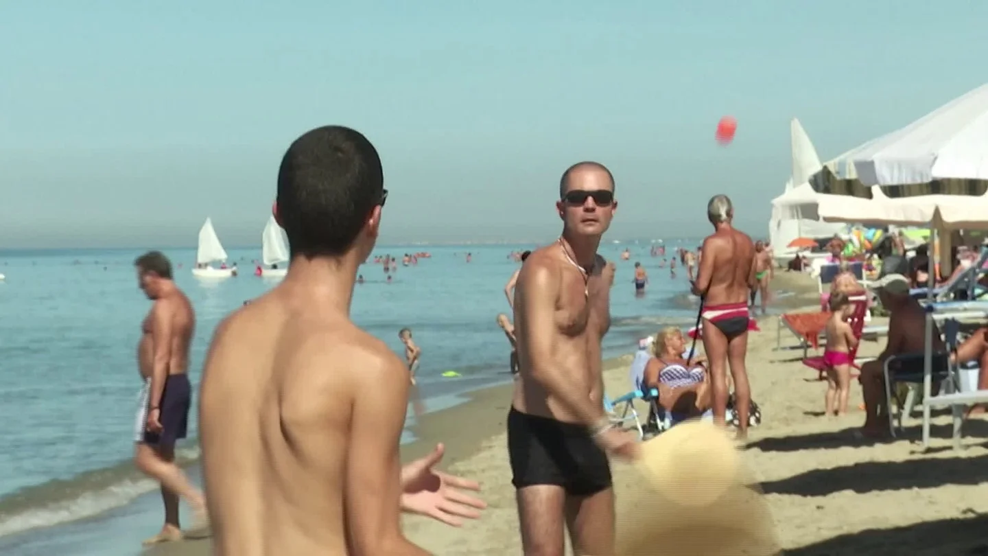 Italians Cool Off On The Beach Happy For Respite From Heat And Coronavirus... Stock Footage