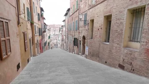 Italy - 03 20 2025: Empty narrow street in a historic town, typical architecture Video stock 324496361