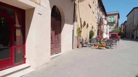 Italy - 03 20 2025: Empty street in a Tuscan village on a sunny day Stock Footage 324519288