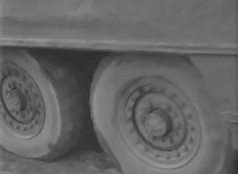ITALY - 1944: Running gear study - Heavy vehicle tires fill a close view Stock Footage 344487763