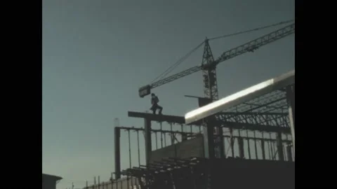 Italy 1971, Workers work on a construction site to build a house Stock Footage 211735750