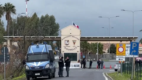 Italy: Anti-war protests erupt outside US Naval air base in Sicily Stock Footage 330794772