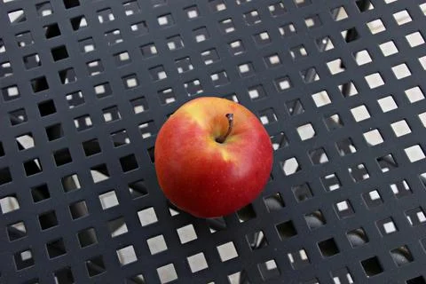 Italy: An apple on the table. Stock Photos