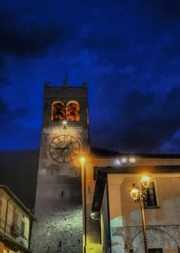 Italy / Bormio clock tower with mullioned windows Stock Photos